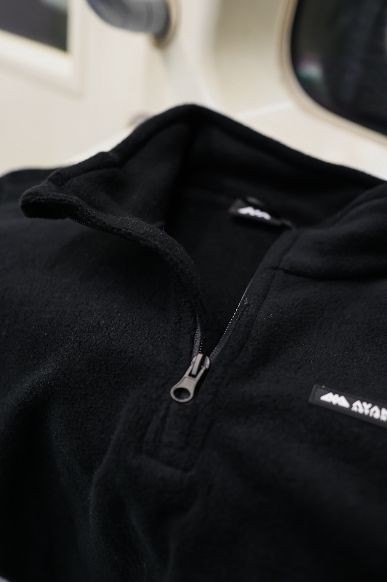 KEEP IT WARM HALFZIP SCHWARZ/WEISS