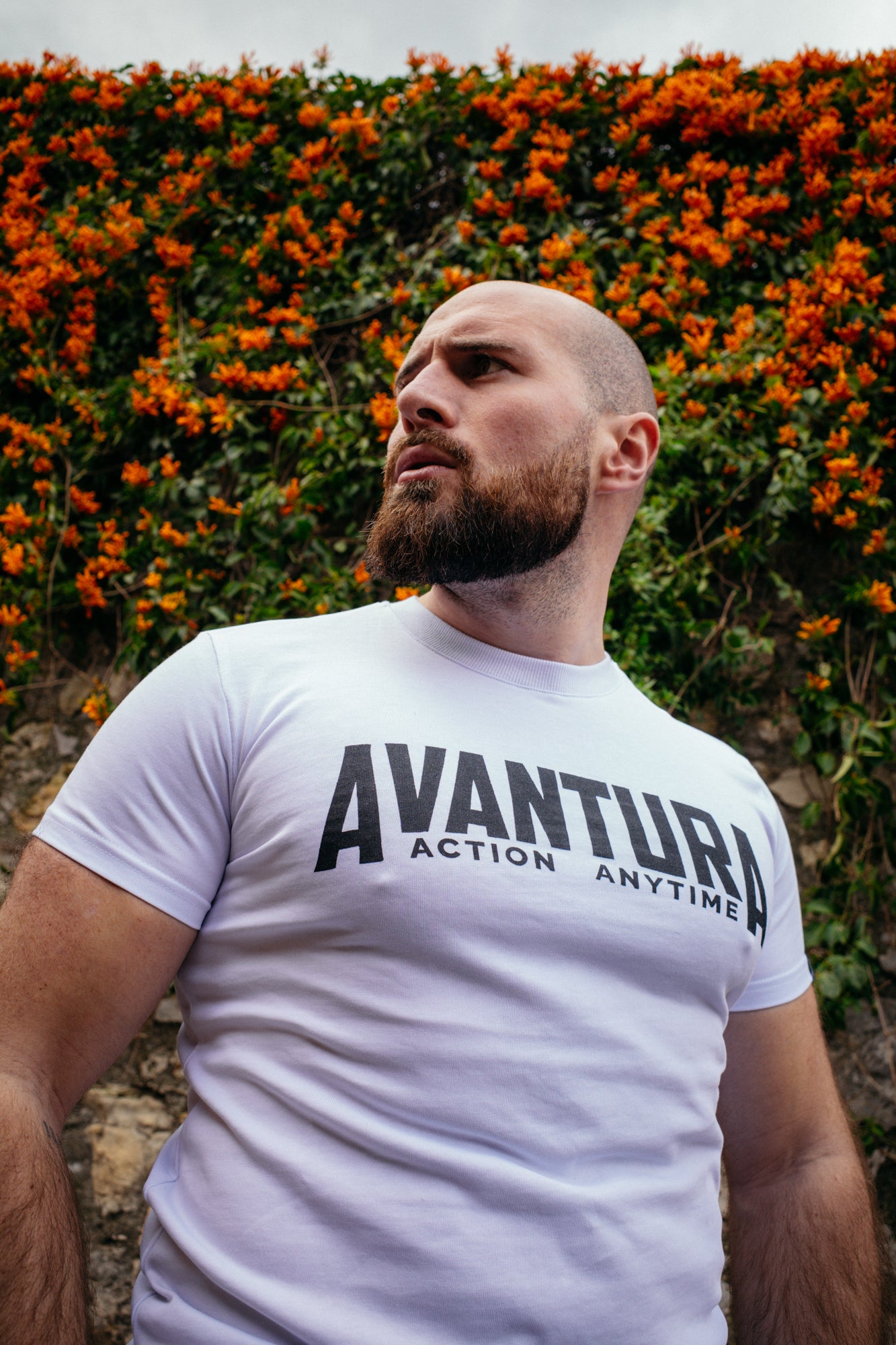 White Avantura Action Anytime T-shirt with black arched chest logo