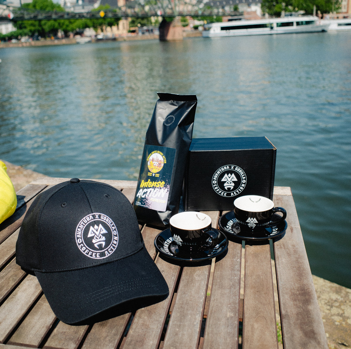 Avantura x Gorilla black baseball cap styled with coffee accessories outdoors