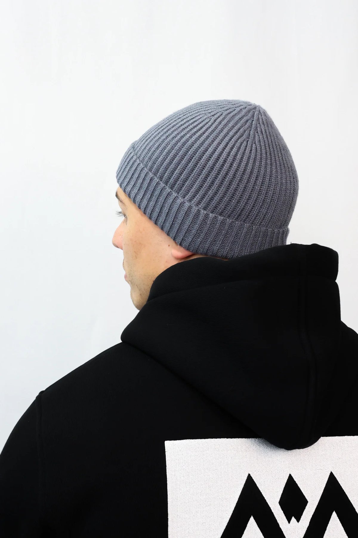 Back view of grey Avantura beanie showing smooth crown