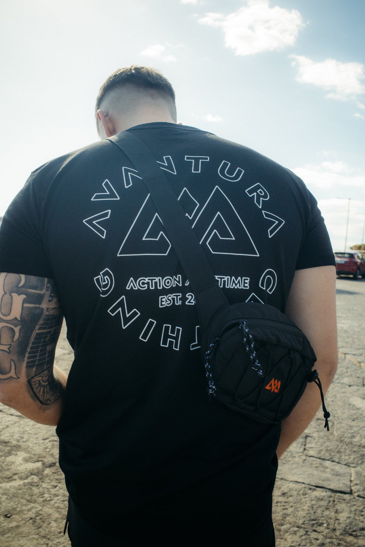 Black T-shirt with large white AVANTURA back print