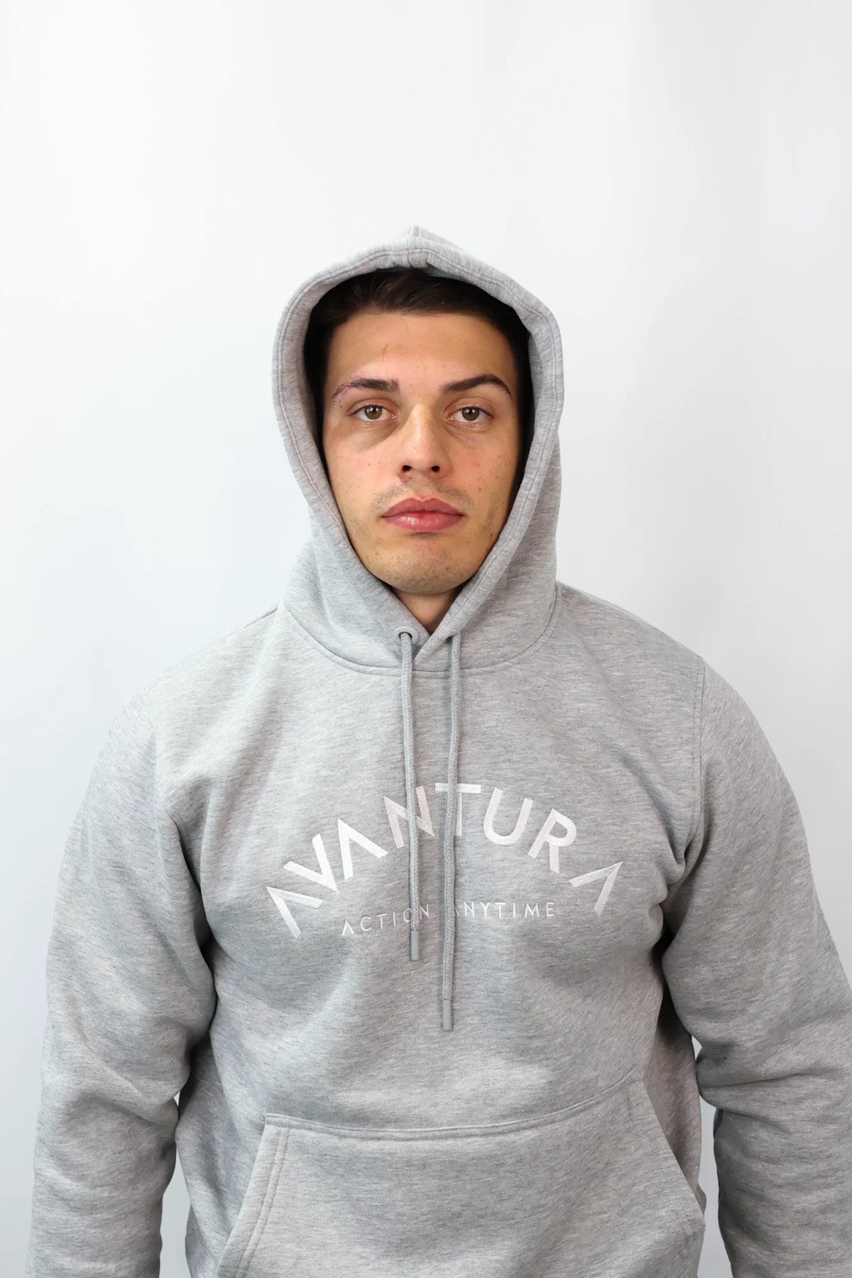 Grey hooded sweatshirt with arched logo and drawstrings