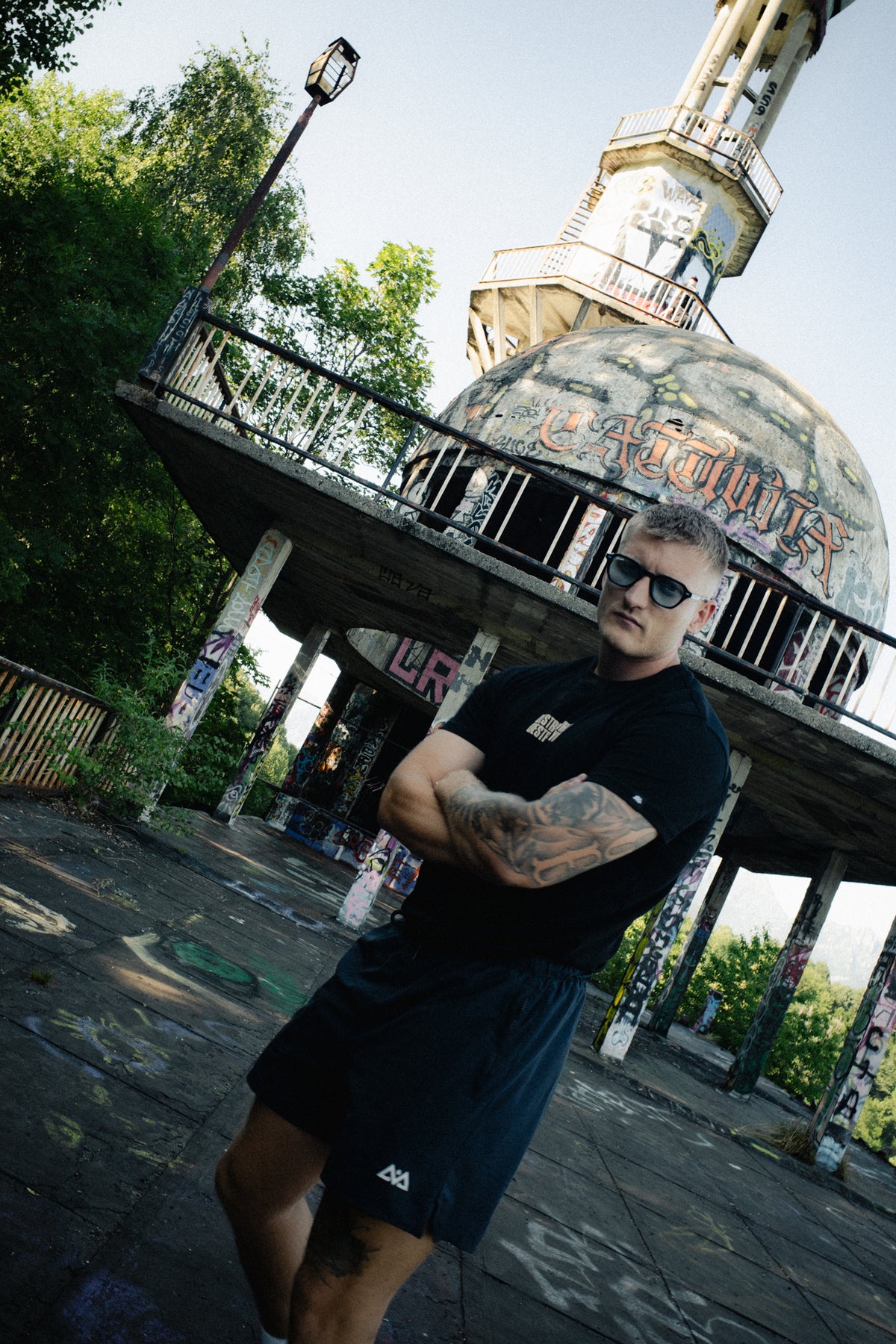 Man wearing black DESTROY T-Shirt and shorts