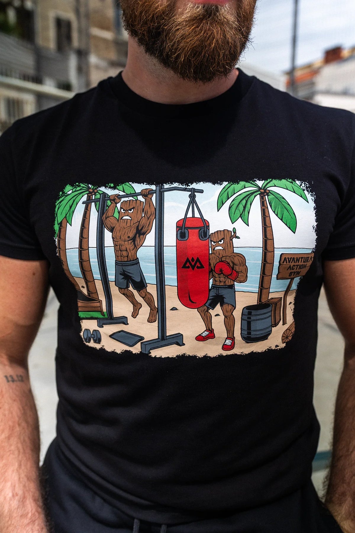 Close-up of black T-shirt with colorful Groot print on punching bag