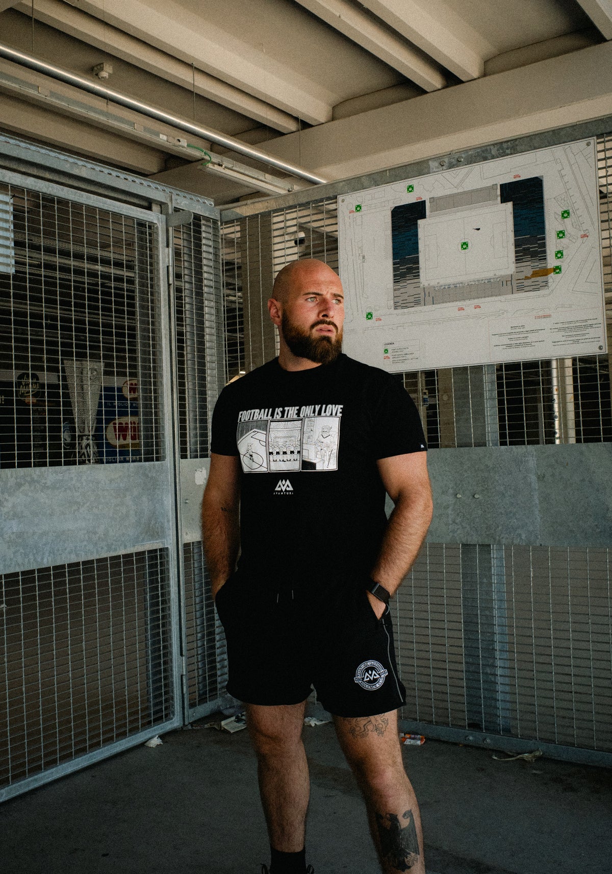 Front view of black Avantura football love T-shirt