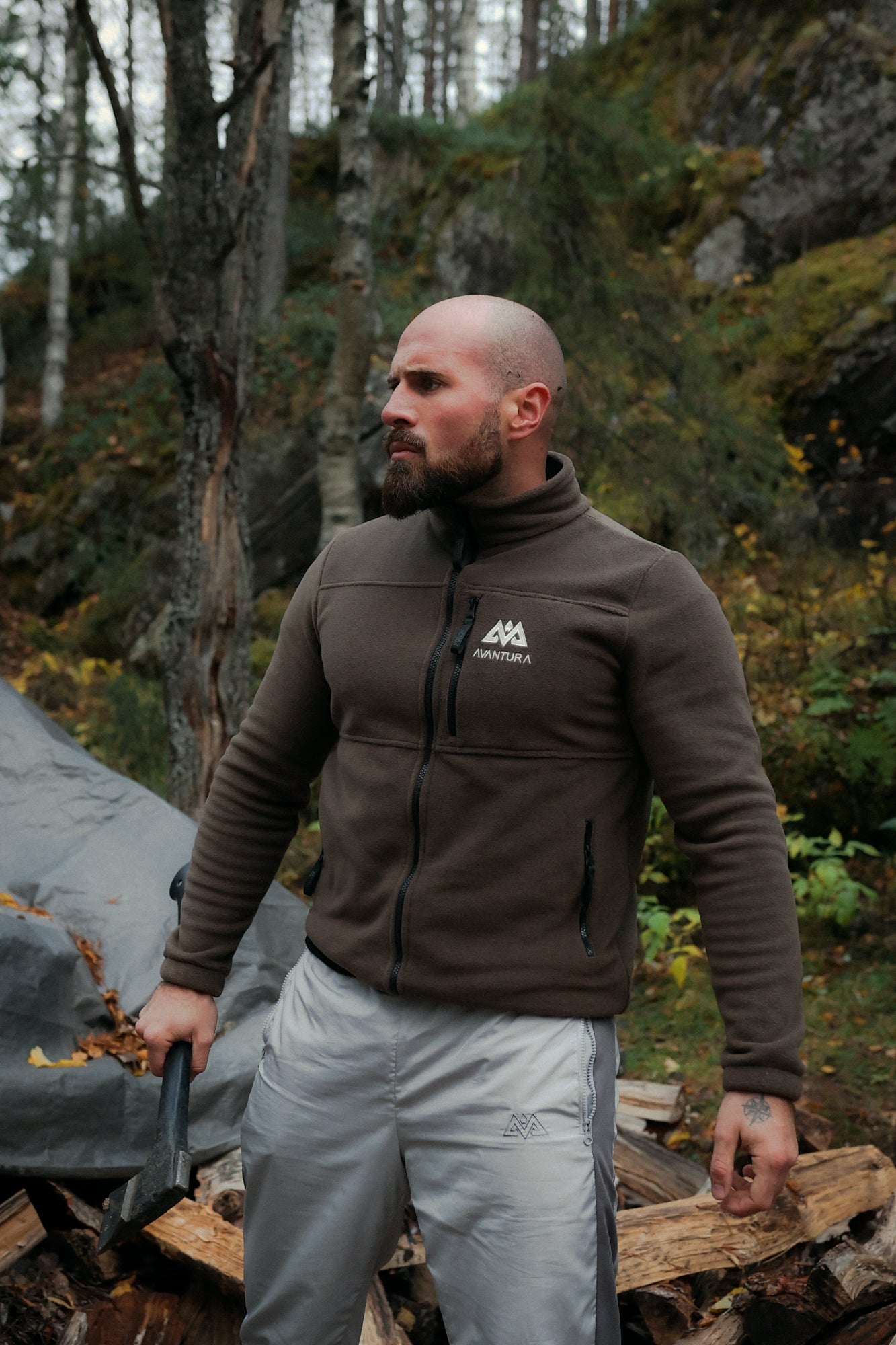 Front view of brown Avantura fleece jacket with zippered chest pocket