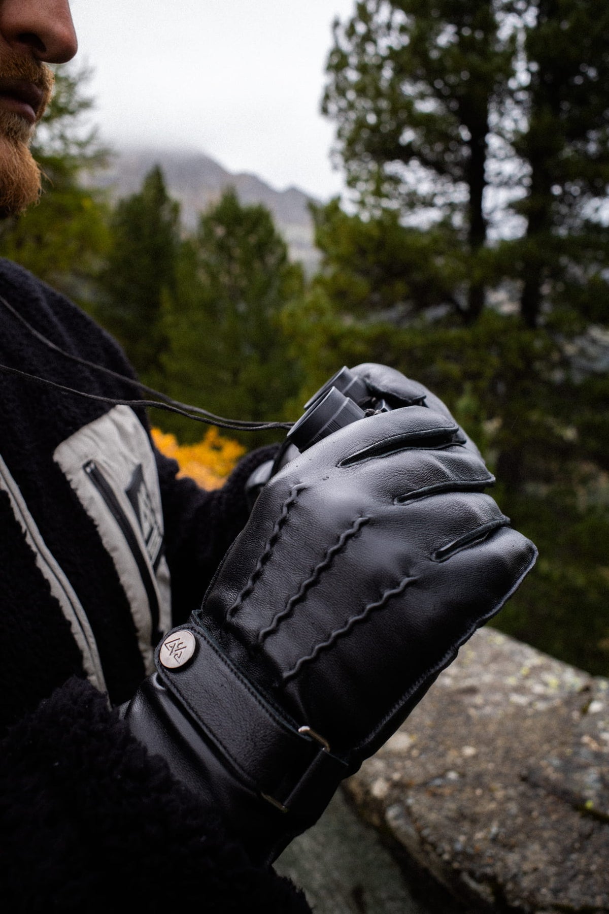 Schwarze Handschuhe für Outdoor-Fotografie mit Steppnaht