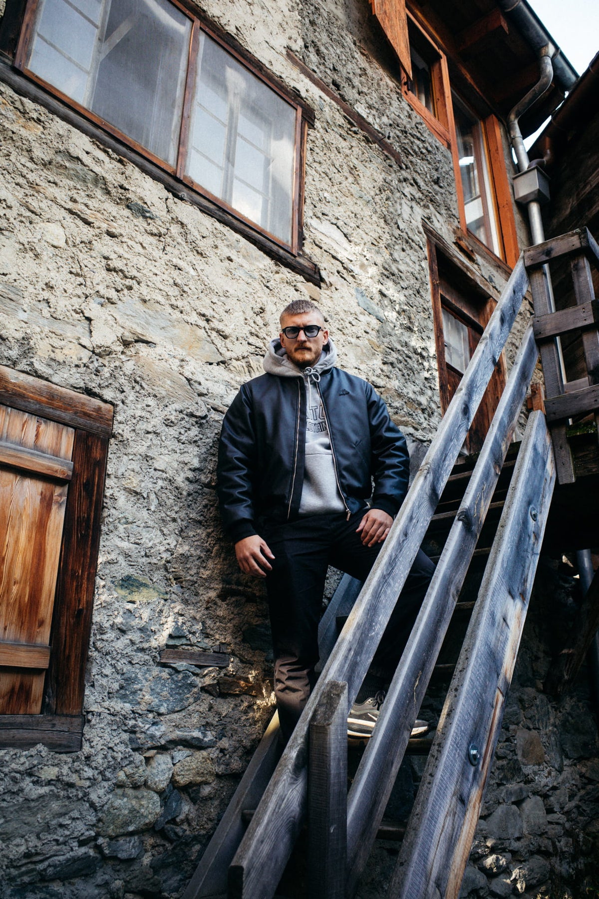 Black faux leather bomber jacket in lifestyle fit with grey hoodie