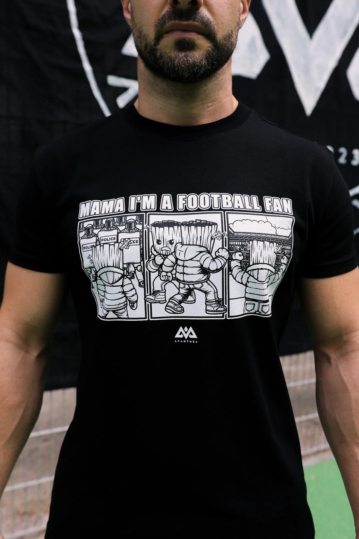 Close-up of the white front print on the black T-shirt