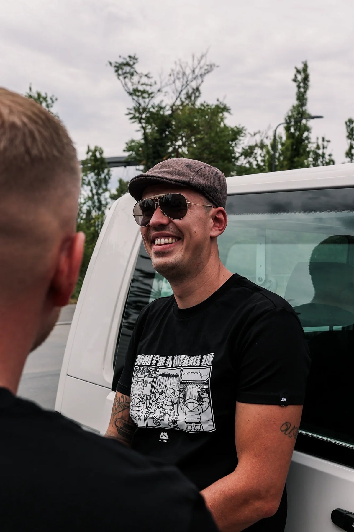 Black T-shirt with white comic print for football fans
