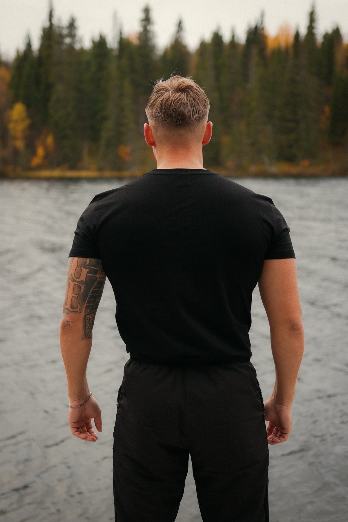MOSAIK Black T-Shirt back view with woven neck label