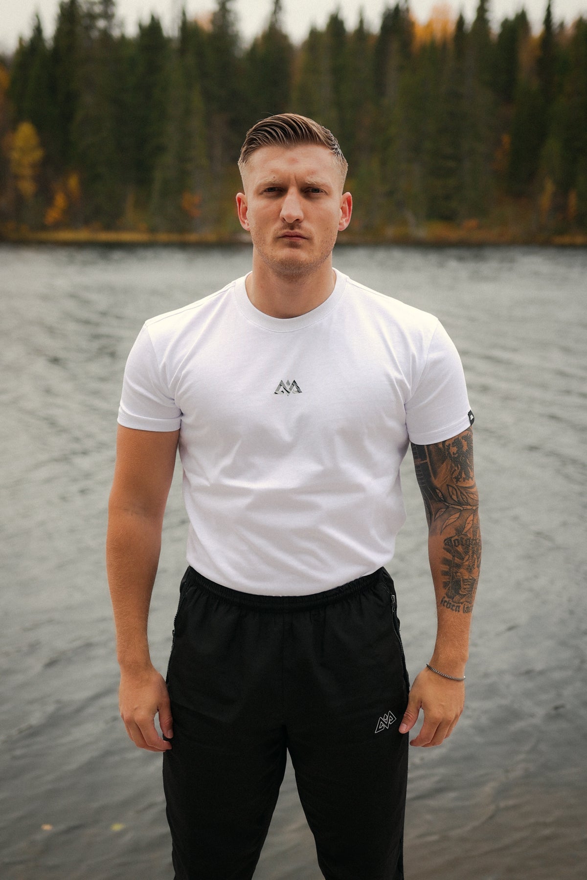 White crew-neck T-shirt front small geometric logo