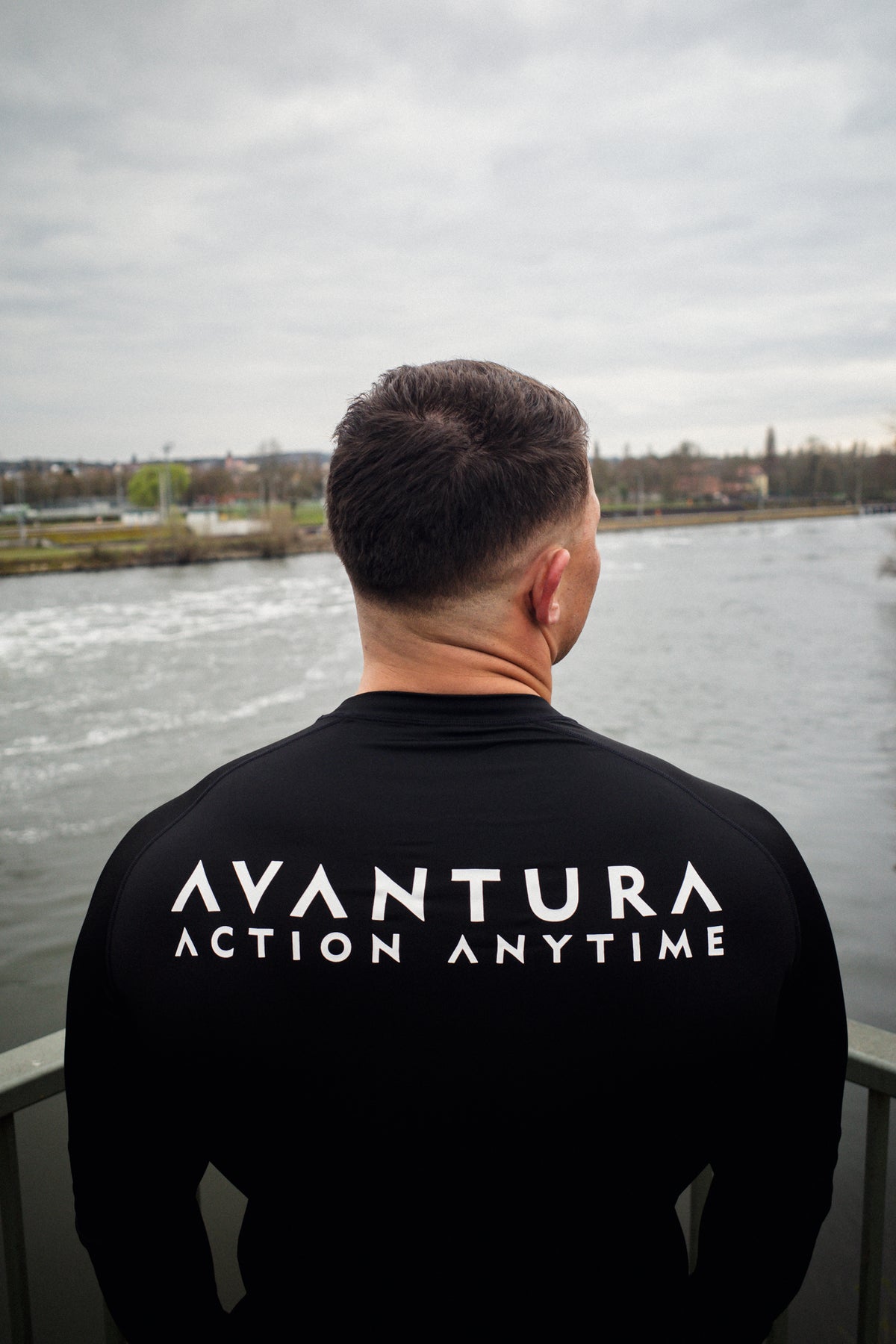 Detail of large back print on black long-sleeve shirt