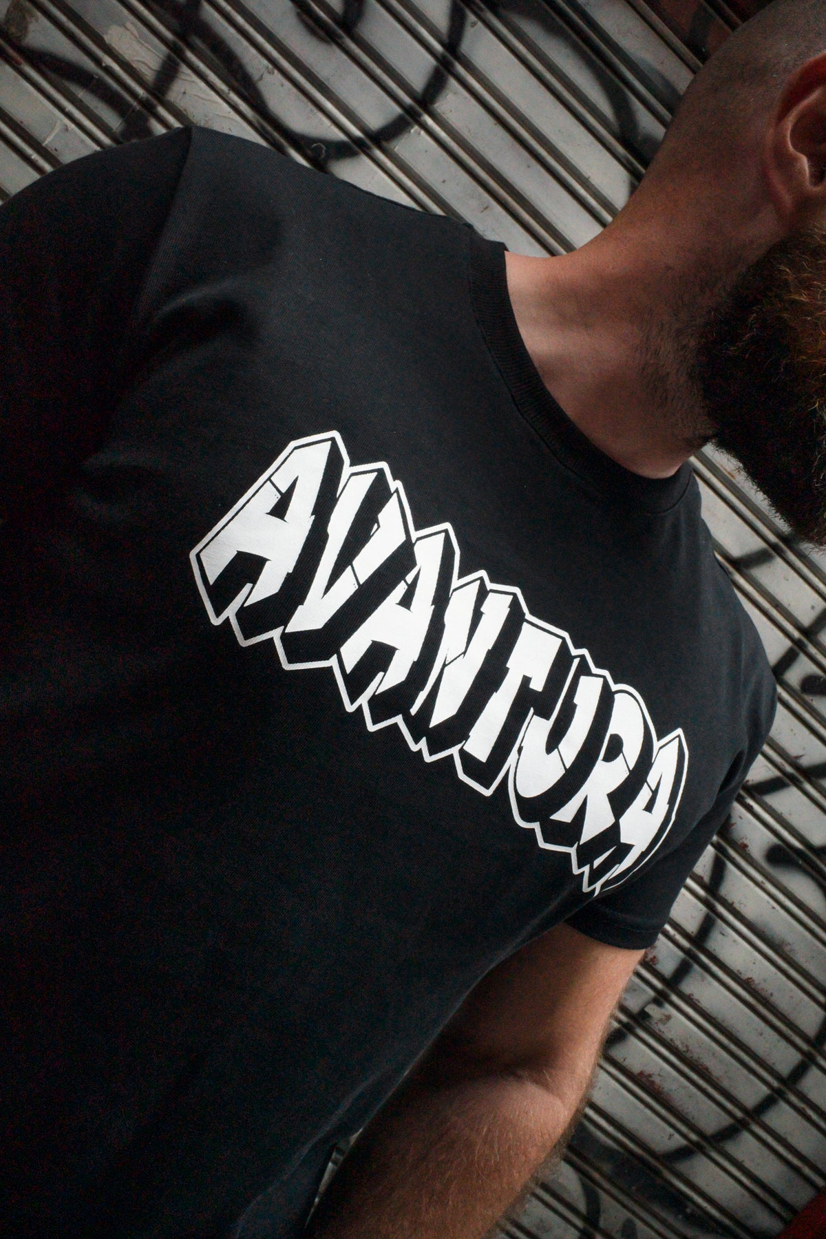 Black crew-neck T-shirt with 3D block effect AVANTURA graffiti logo