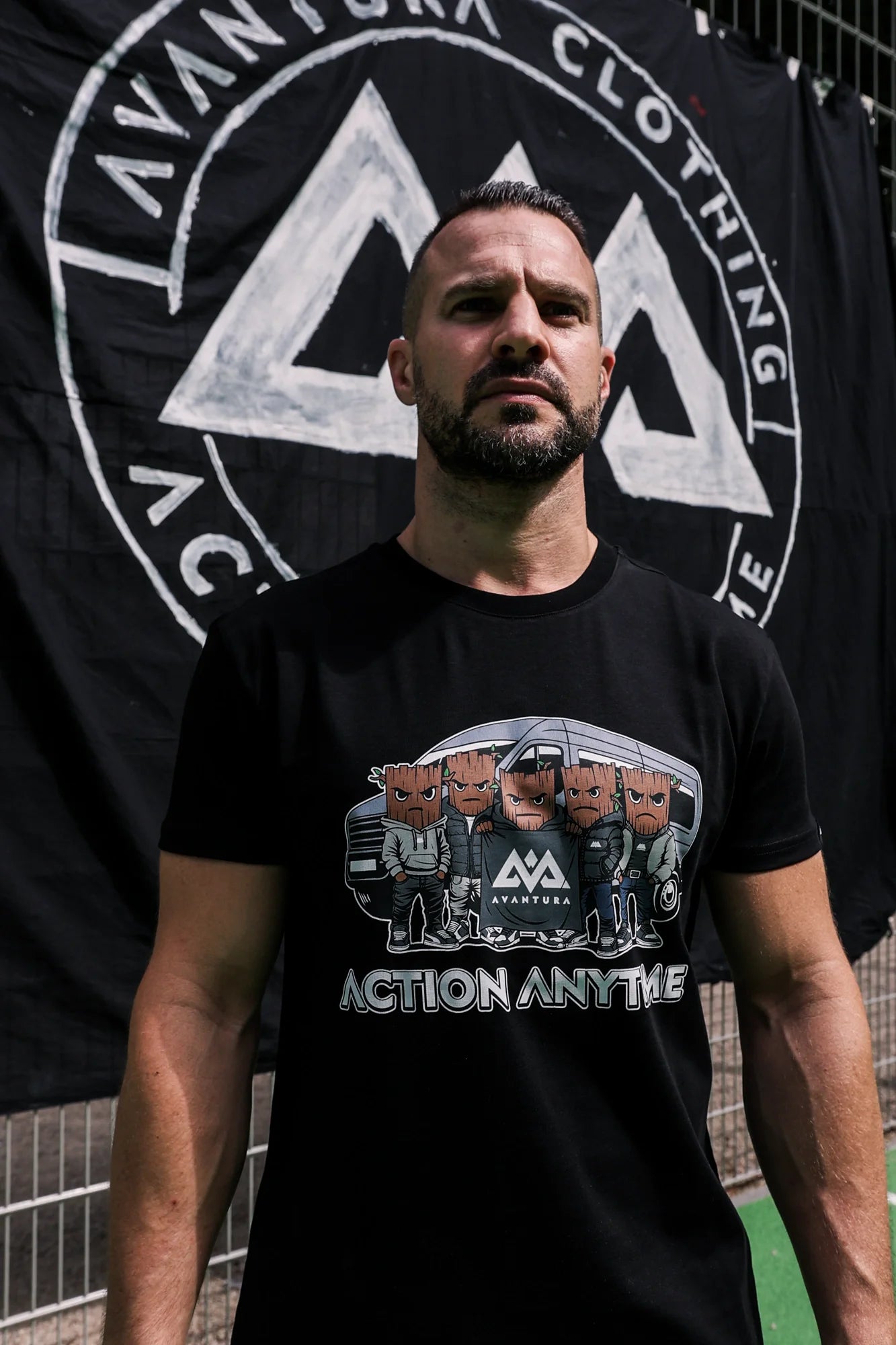 Men's black T-shirt with detailed streetwear cartoon print and logo