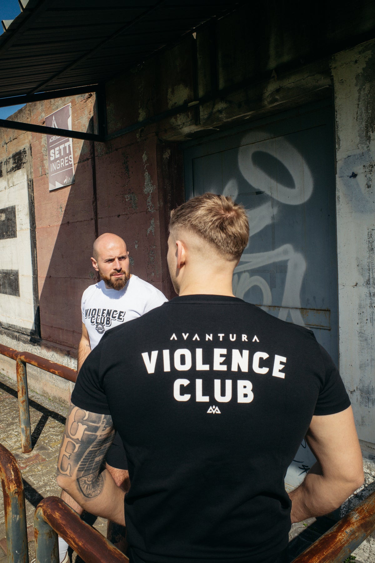 Back view black T-shirt with white AVANTURA VIOLENCE Club print