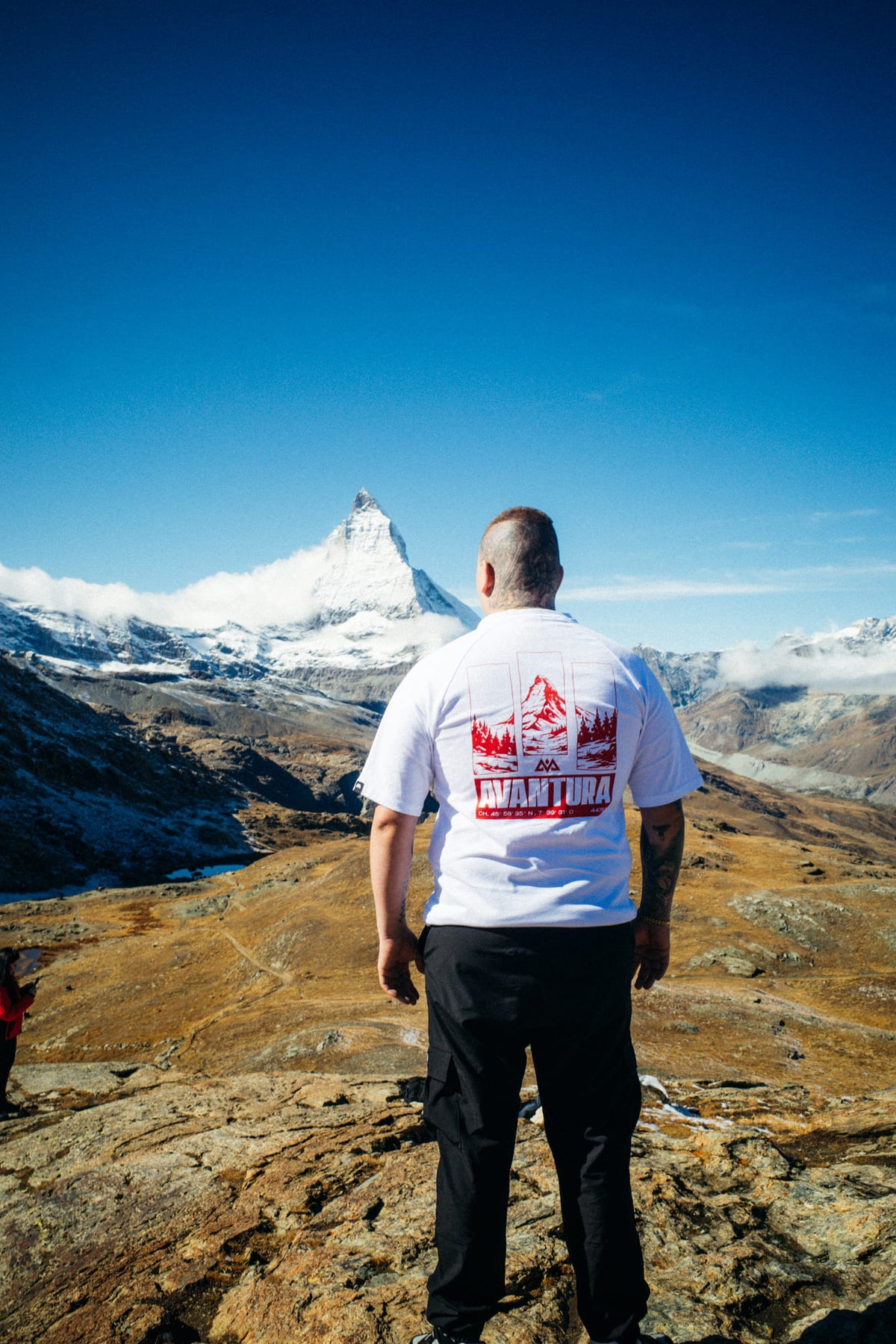 White oversized T-shirt with large red back print and mountain motif
