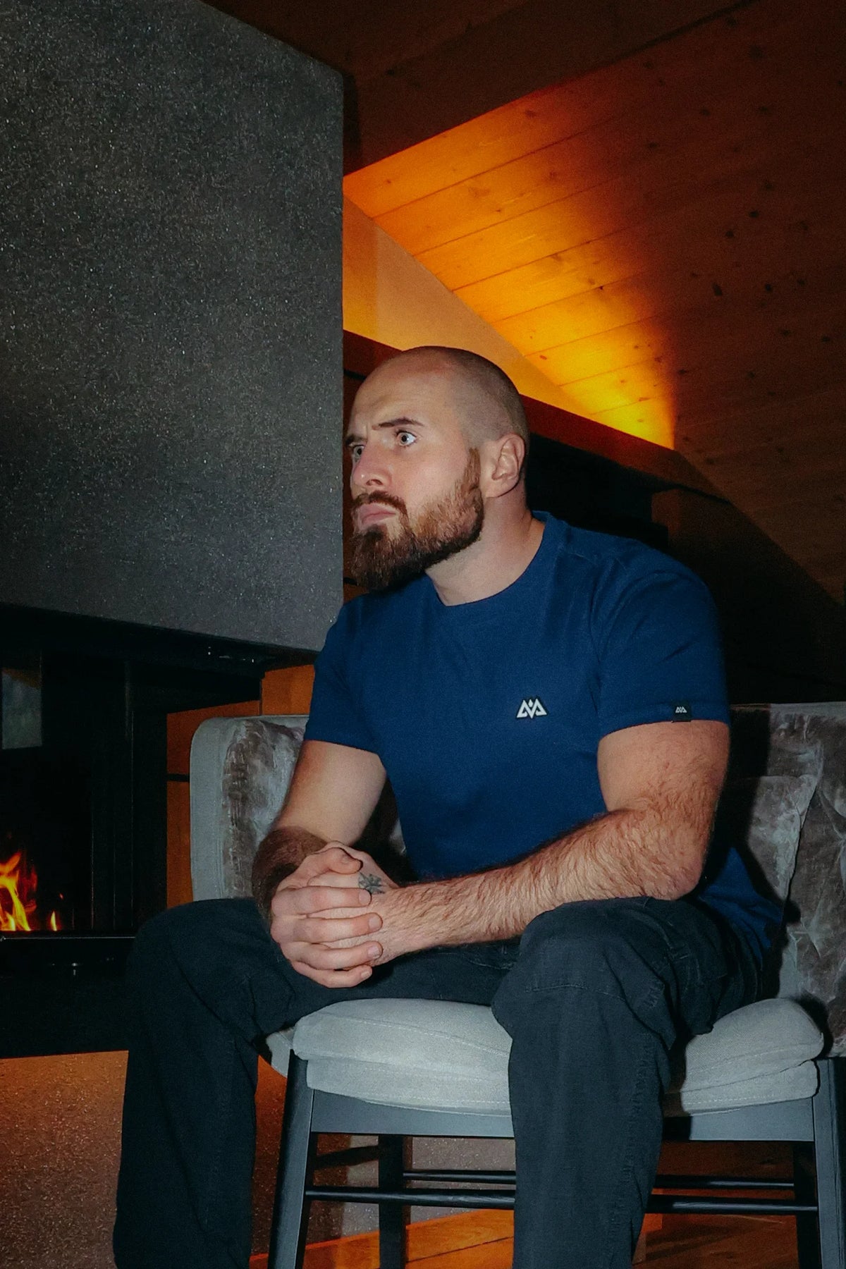 Tailored fit dark blue t-shirt on model showing relaxed posture