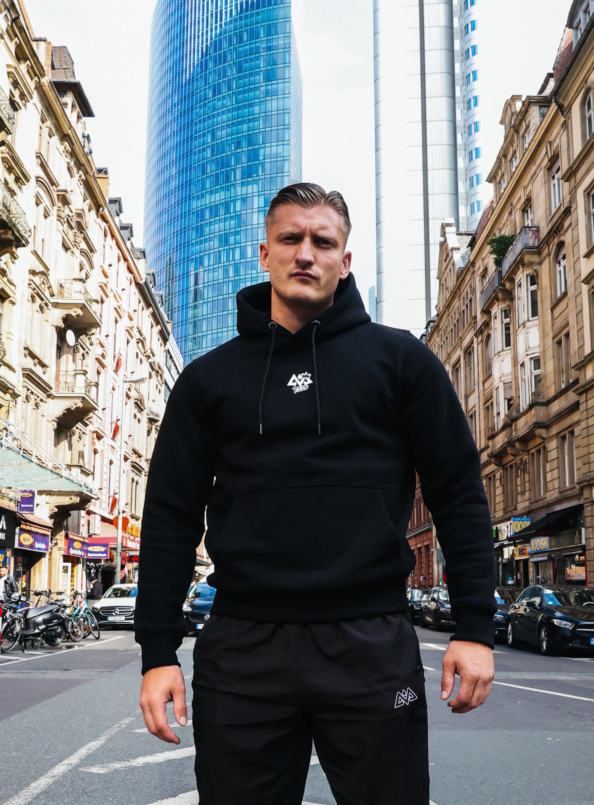 Black Avanta hoodie with minimalist white logo on chest for men