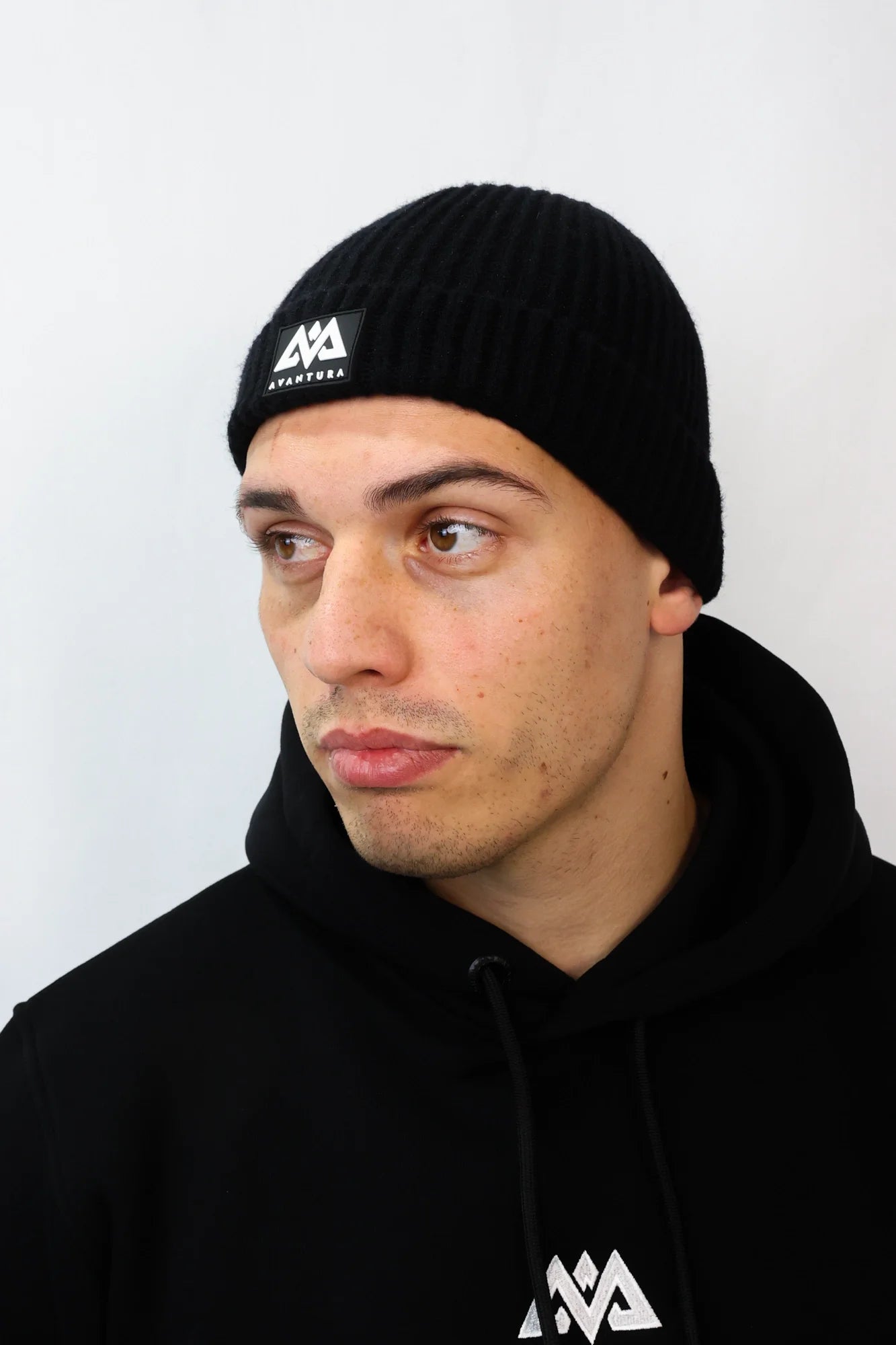 Black Avantura beanie with rubber patch logo