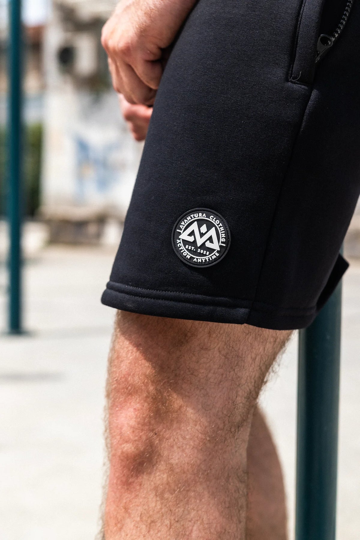 Black shorts detail with embroidered rubber patch logo