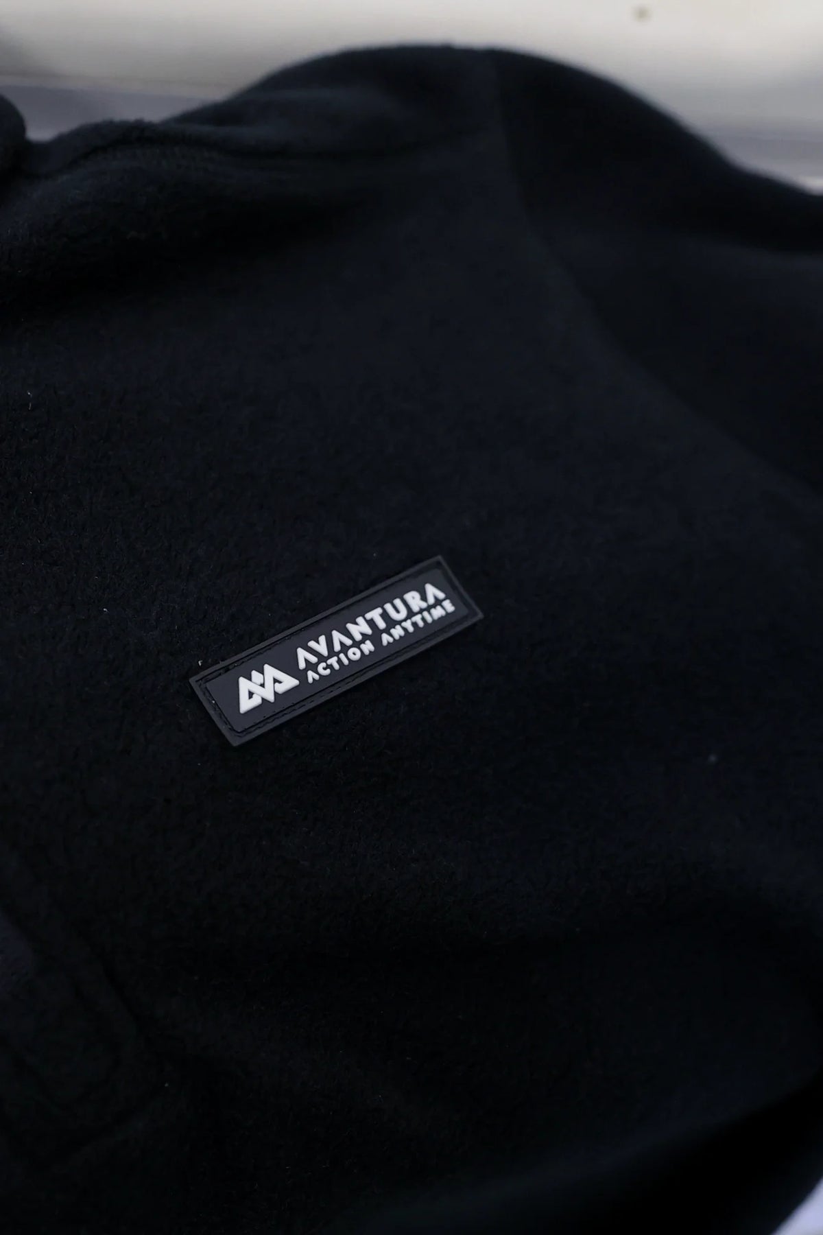 Black Avantura half-zip fleece sweater chest logo patch detail