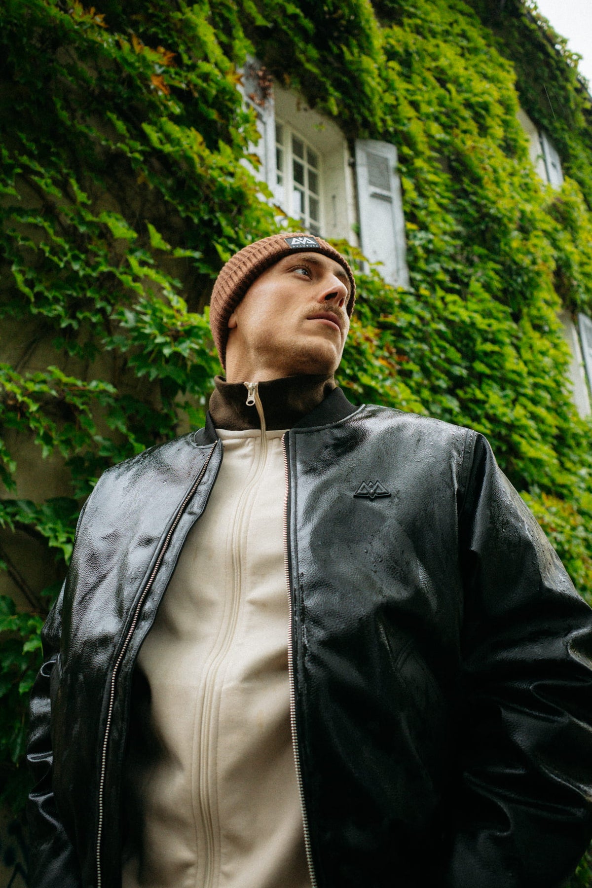 Close-up of black leather jacket with stand-up collar