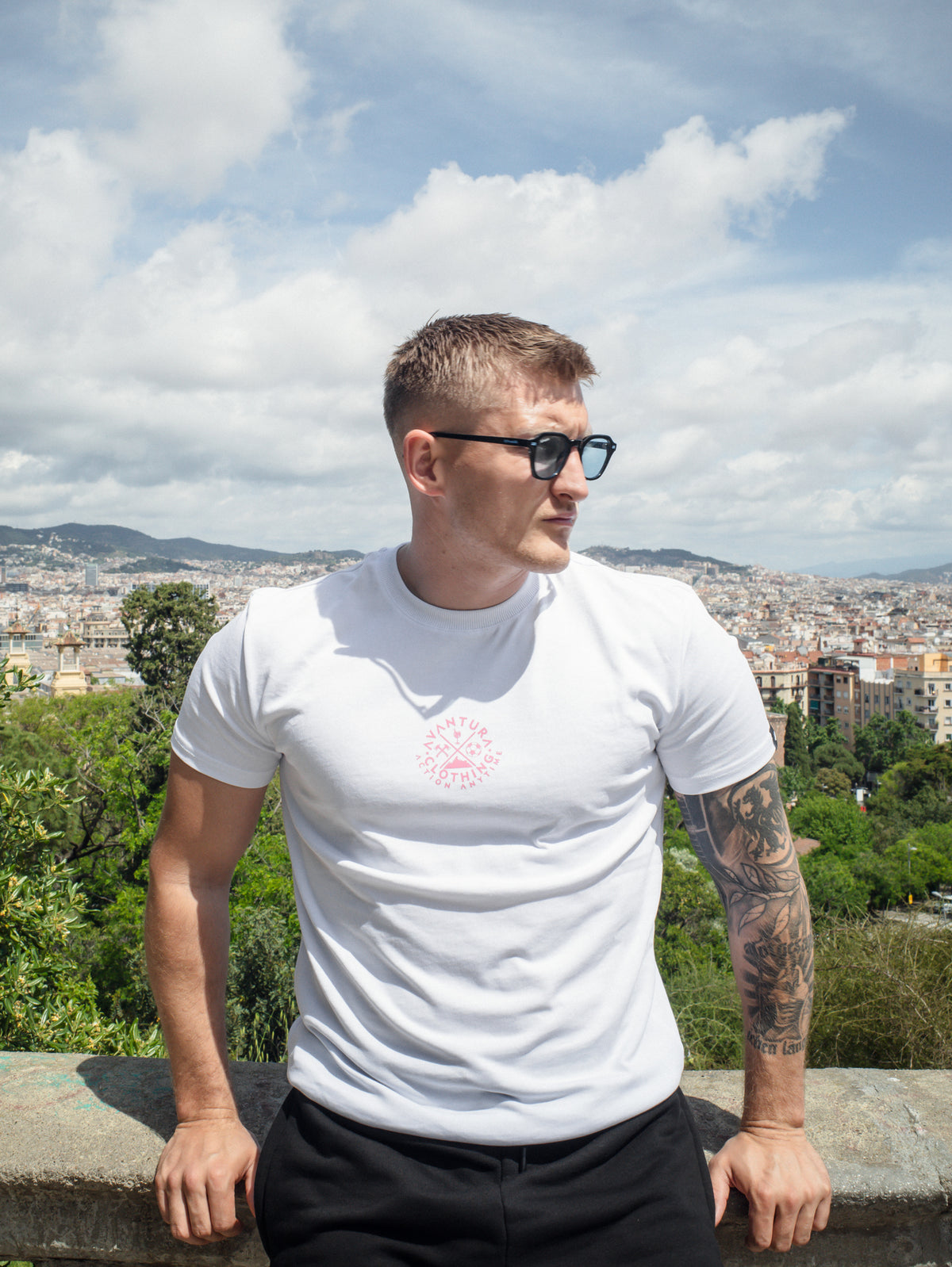 White short sleeve t-shirt with compact pink logo print on chest front