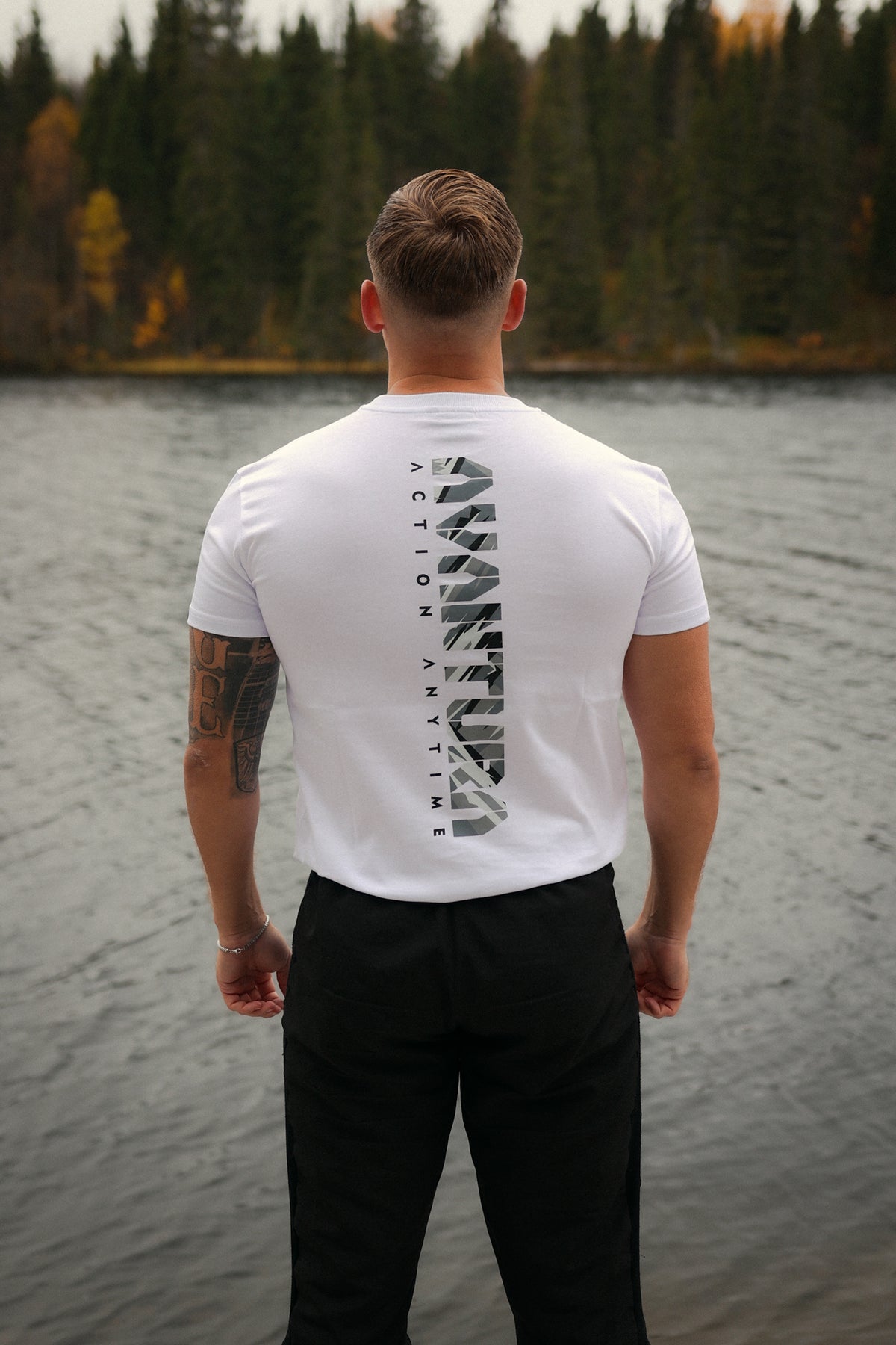 White T-shirt rear view showing vertical Avventura back design