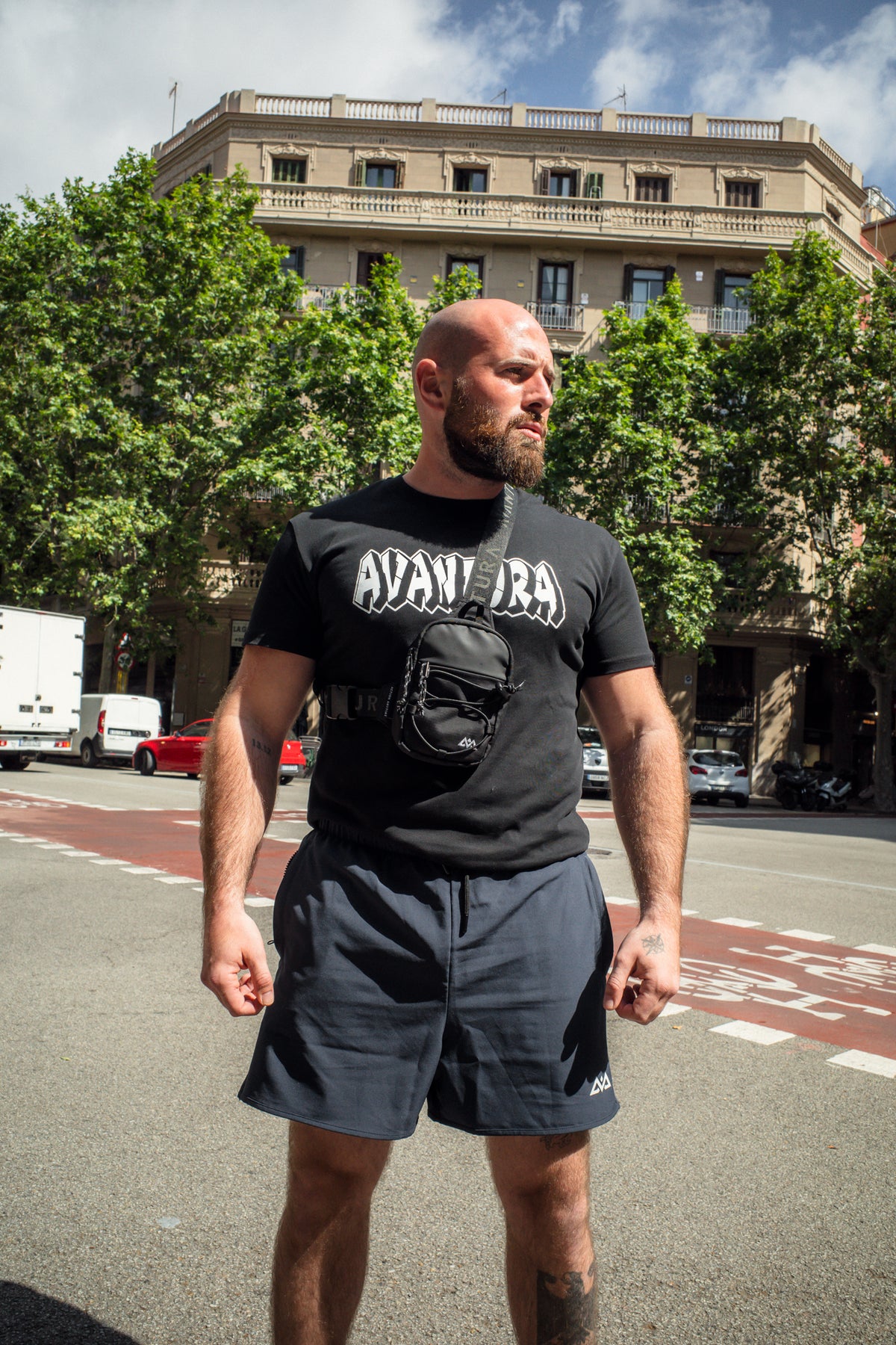 Black Avantura streetwear T-shirt with large white graffiti logo on chest