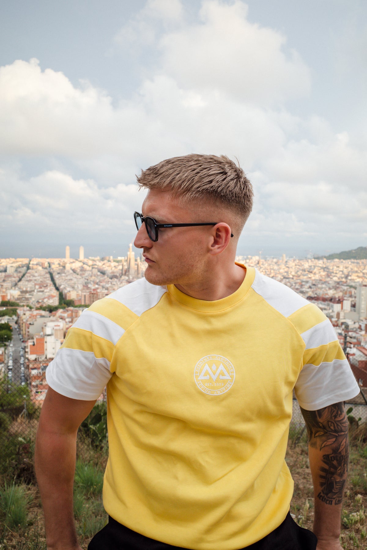Close-up of yellow t-shirt chest logo detail
