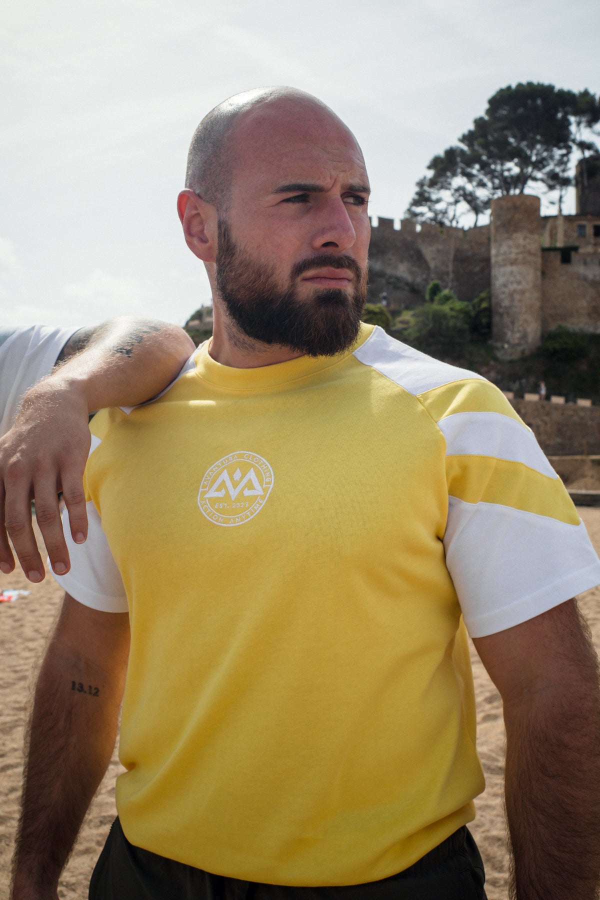 Yellow striped t-shirt back view with logo
