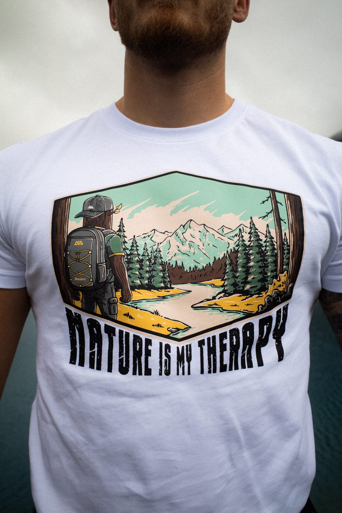 Close-up of the hexagonal hiker print on the T-shirt
