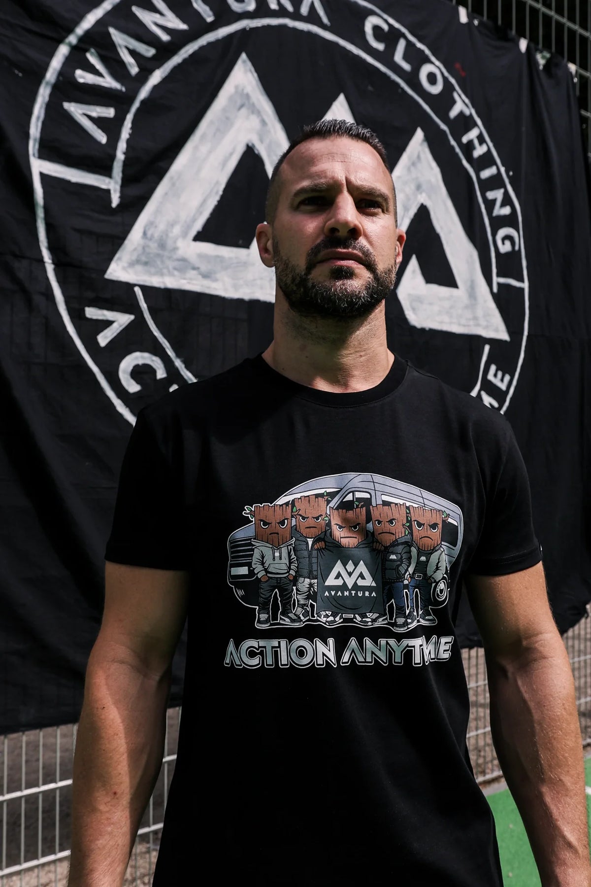 Men's black T-shirt with detailed streetwear cartoon print and logo