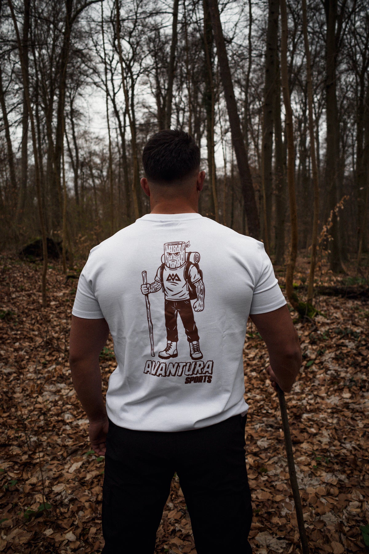 White Avantura T-shirt back print featuring hiker graphic and AVANTURA SPORTS text